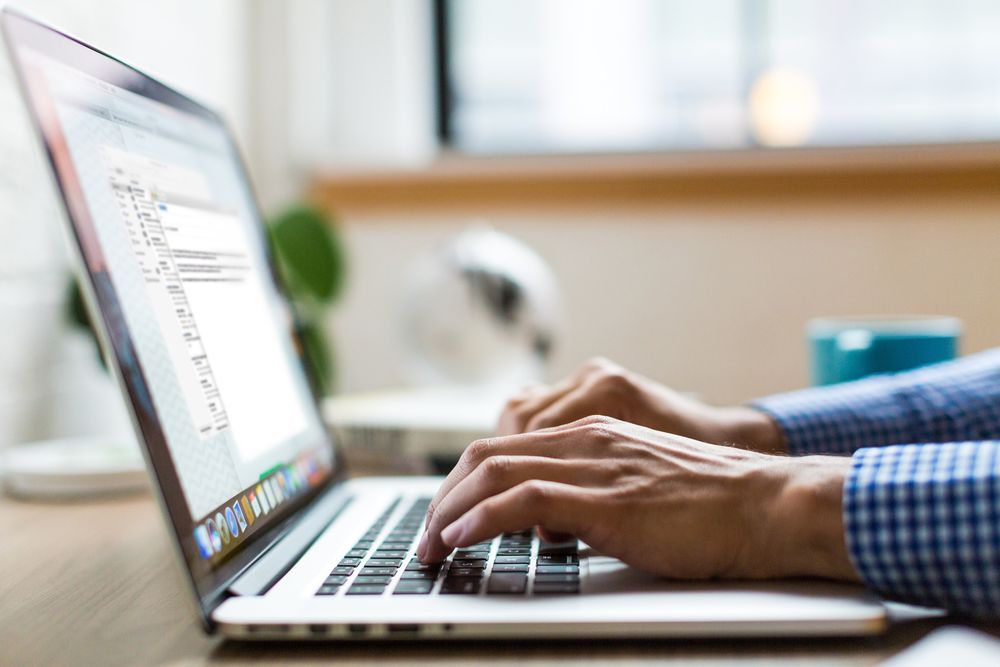 Consultant working on a laptop